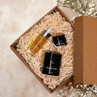 Yokaba gold treasure zestaw prezentowy olejek do twarzy i szyi 30ml pomarańczowy peeling 100ml pomarańczowy balsam do ust 15ml